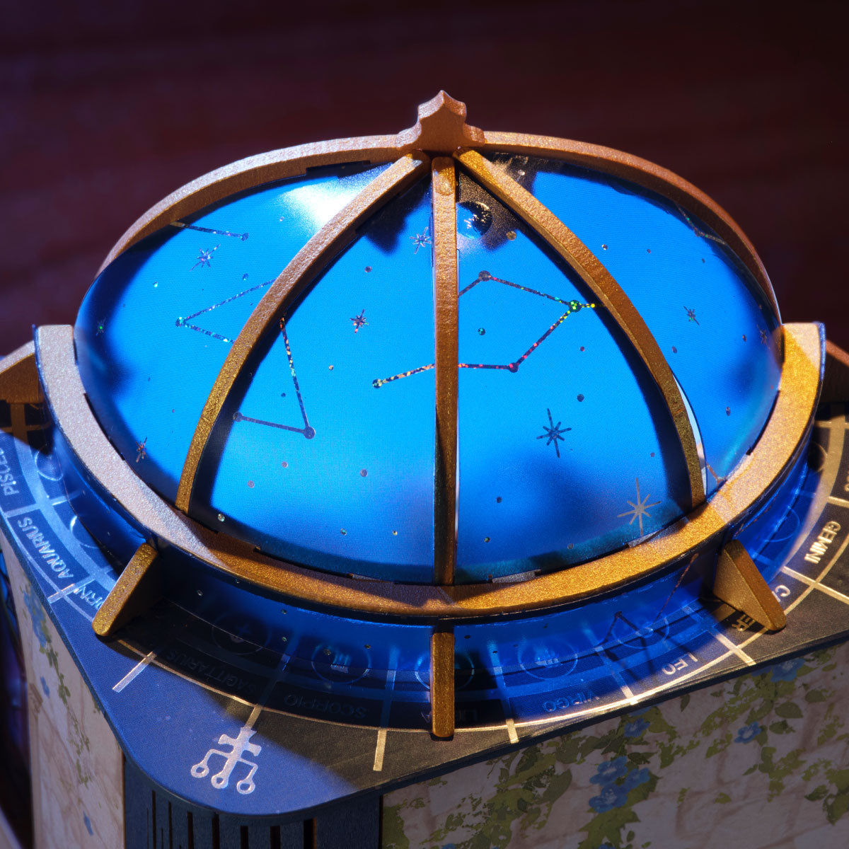 Rolife Astral Dome DS058 close-up of blue observatory dome with gold frame, constellation markings and zodiac signs