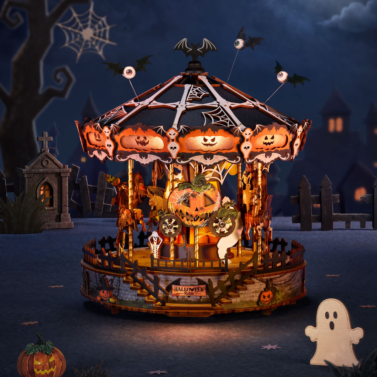 Rolife Phantom Waltz DIY Music Box AMS04 illuminated Halloween carousel scene with pumpkins, ghosts, graveyard decor, and night lighting