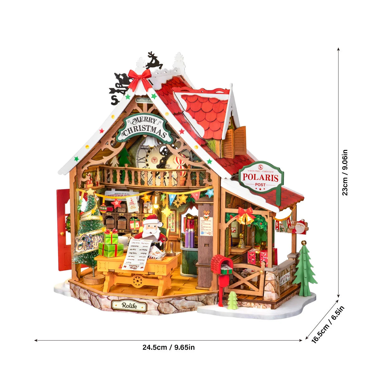Rolife miniature Christmas post office shown with dimensions: 24.5cm / 9.65in wide, 23cm / 9.06in high and 16.5cm / 6.5in deep.