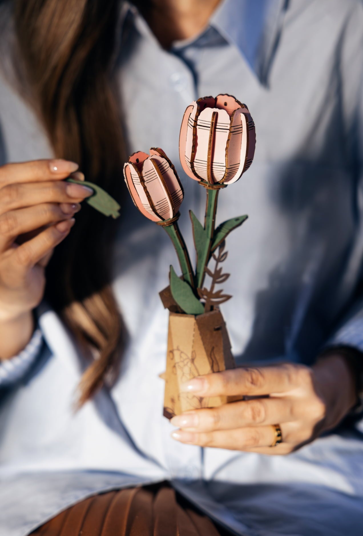 Wooden tulip automaton with two striped flowers held upright in a small square pot
