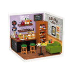 Rolife Leisurely Cheers Bar DW012 completed miniature scene featuring a bar counter with bottle shelves, green sofa and
