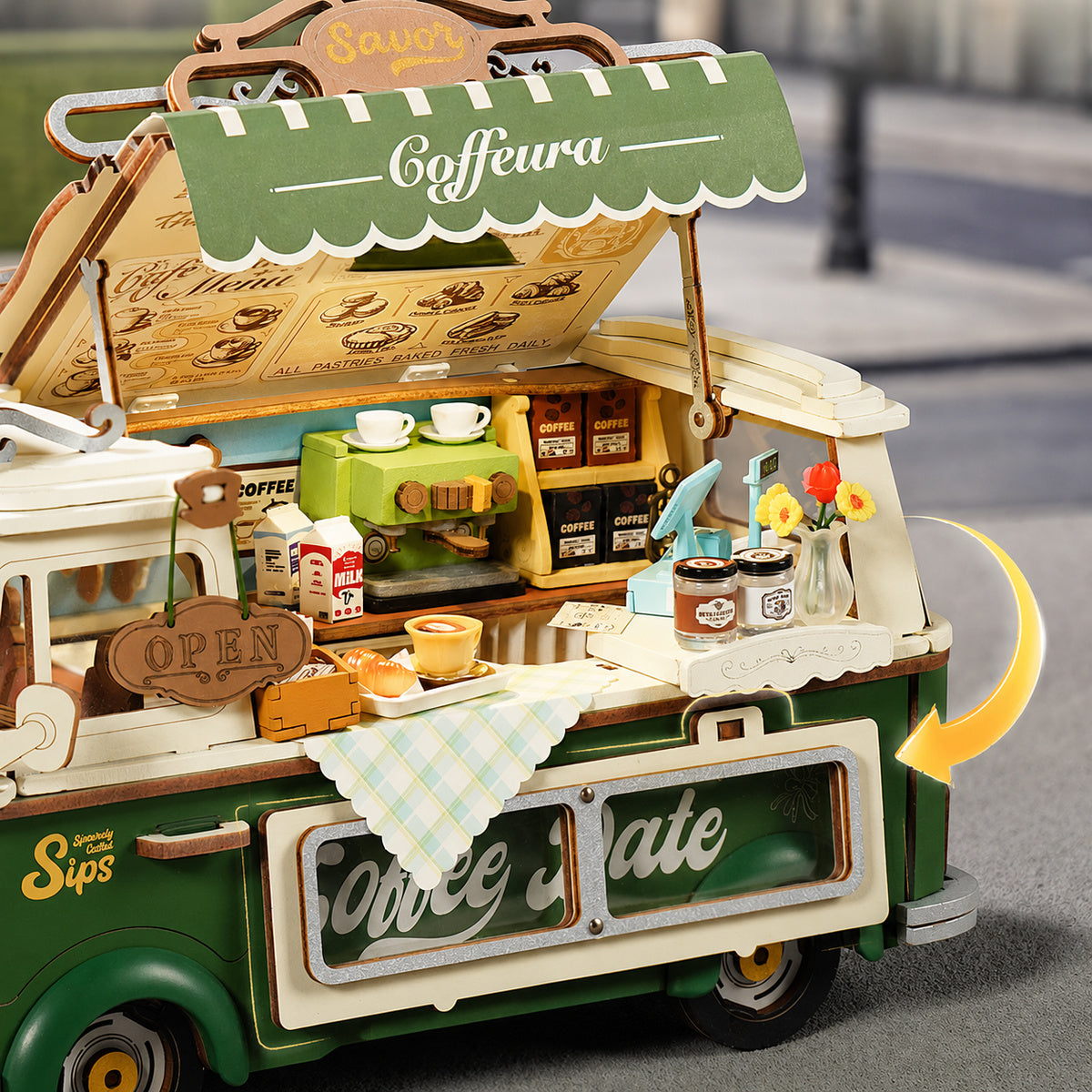 Rolife Leo's Coffee Truck close up of Coffeura menu board, espresso machine and serving window with green awning