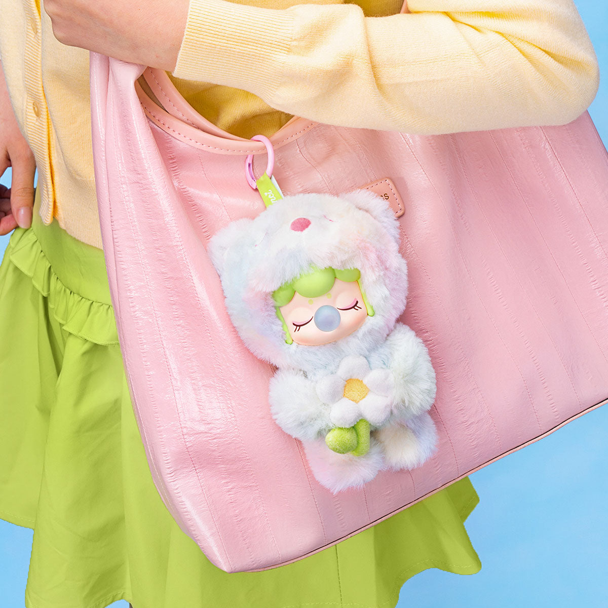 Nanci Spring Bear plush pendant attached to a pink bag as a cute plush charm
