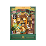 Rolife Quiet Corner Study book nook main view with green exterior facade and a warmly lit cozy miniature study inside